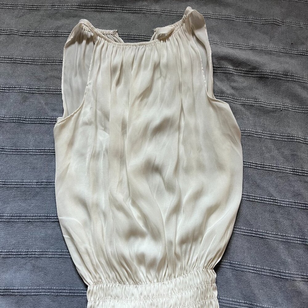 Cream sleeveless top